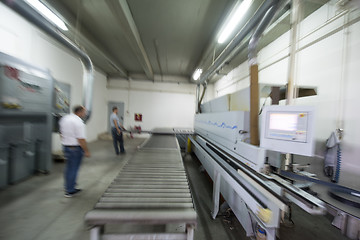 Image showing workers in a factory of wooden furniture