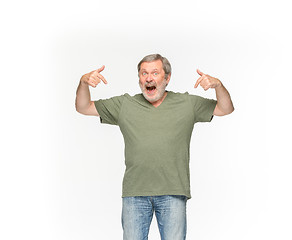 Image showing Closeup of senior man\'s body in empty green t-shirt isolated on white background. Mock up for disign concept