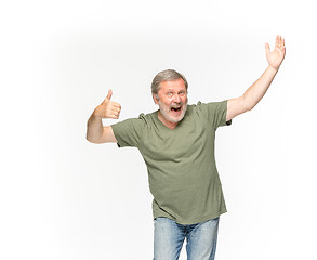 Image showing Closeup of senior man\'s body in empty green t-shirt isolated on white background. Mock up for disign concept