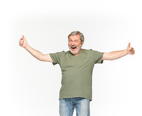 Image showing Closeup of senior man\'s body in empty green t-shirt isolated on white background. Mock up for disign concept