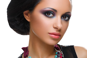 Image showing Beautiful girl with bright vivid purple and green make-up 