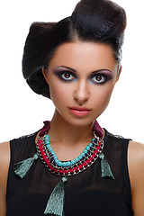 Image showing Beautiful girl with bright vivid purple and green make-up 