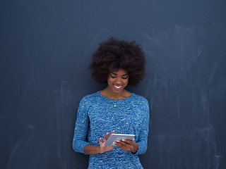 Image showing Happy African American Woman Using Digital Tablet