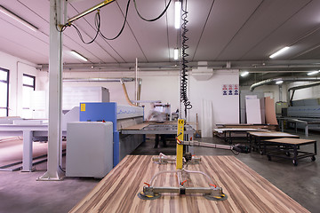 Image showing worker in a factory of wooden furniture