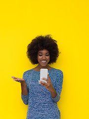 Image showing young black Woman Using mobile phone