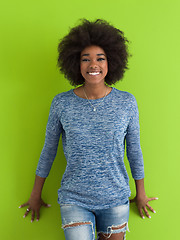 Image showing black woman isolated on a Green background