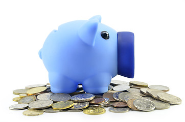 Image showing Blue piggybank with coins