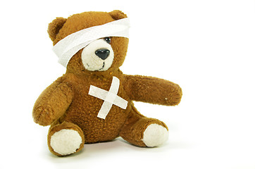 Image showing Injured teddy bear with bandages