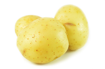 Image showing Three whole raw potatoes