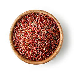 Image showing wooden bowl of red rice