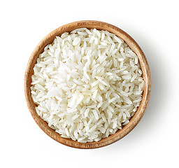 Image showing wooden bowl of raw rice