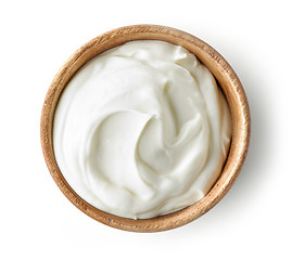 Image showing sour cream or yogurt in wooden bowl