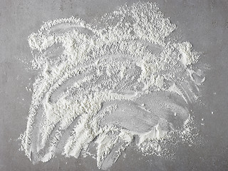 Image showing white flour on grey kitchen table