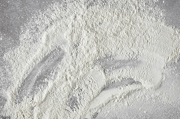 Image showing white flour on grey kitchen table