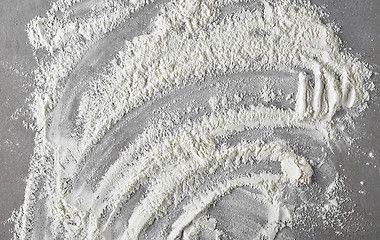 Image showing white flour on grey kitchen table