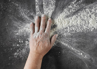 Image showing bakers hand with flour 