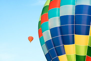 Image showing Big and small colorful hot air balloons