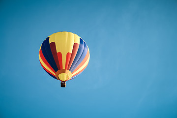 Image showing Colorful hot air balloon in the blue sky