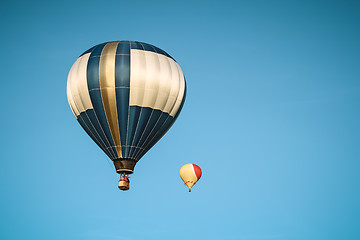 Image showing Two hot air balloons in the clear sky