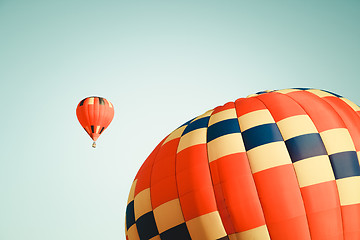 Image showing Two vibrant hot air balloons