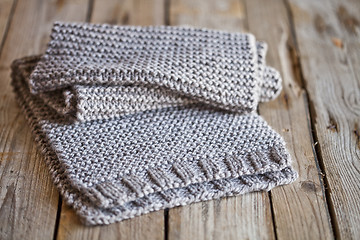 Image showing Beige knitted wooden scarf