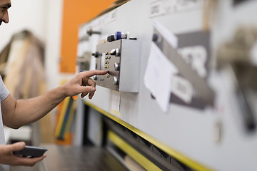 Image showing worker in a factory of wooden furniture