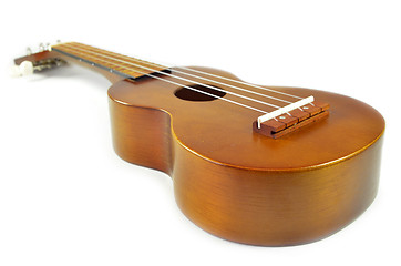 Image showing Brown ukulele guitar