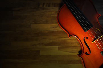 Image showing Violin on rustic wooden background