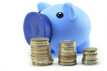 Image showing Blue piggybank with coins