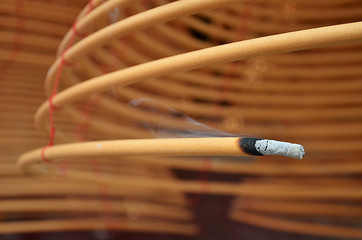 Image showing Circular incenses burning in Chinese temple