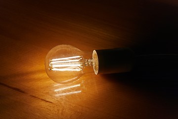 Image showing Light bulb on a table