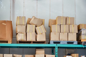 Image showing Warehouse with boxes on pallets