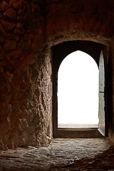 Image showing Passage of an old castle, open door