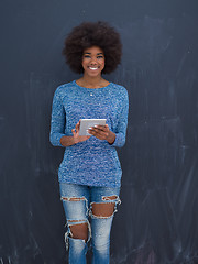 Image showing Happy African American Woman Using Digital Tablet