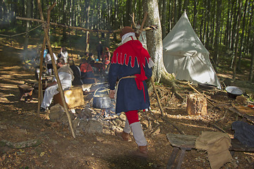 Image showing Medieval Camp in the forest cooking in the kettle