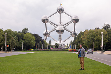 Image showing portrait of man in front of atomium building in Brussels