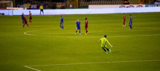 Image showing Soccer goalkeeper kicks out the ball