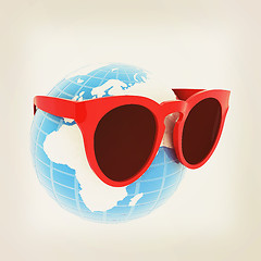 Image showing Earth planet with earphones and sunglasses. 3d illustration. Vin