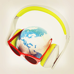 Image showing Earth planet with earphones and sunglasses. 3d illustration. Vin