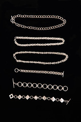 Image showing Display of silver necklace and bracelets