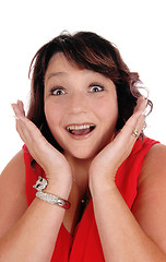 Image showing Surprised woman with hands on her face