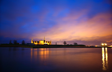 Image showing Kronborg Castle at night seen from Elsinore harbour