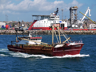 Image showing Fishing Boat Leaving Port.