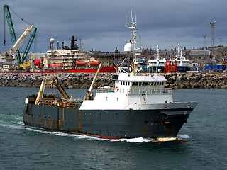 Image showing Trawler Leaving Port.