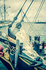 Image showing Old sailboat in the harbor, toning