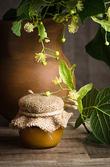 Image showing Jar with white honey on the table,close-up