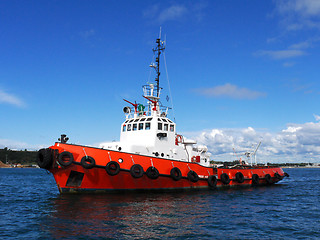 Image showing Red Tug Anchored.