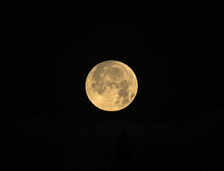 Image showing Rising Cold Moon on Black Background