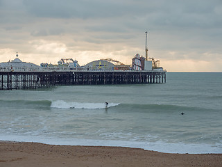 Image showing Surfers Near Brighton Pier During December