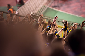 Image showing soccer fans hands clapping while supporting their team